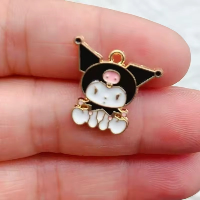 Dije Sanrio Metlálicos 4 Pack 50%Desc