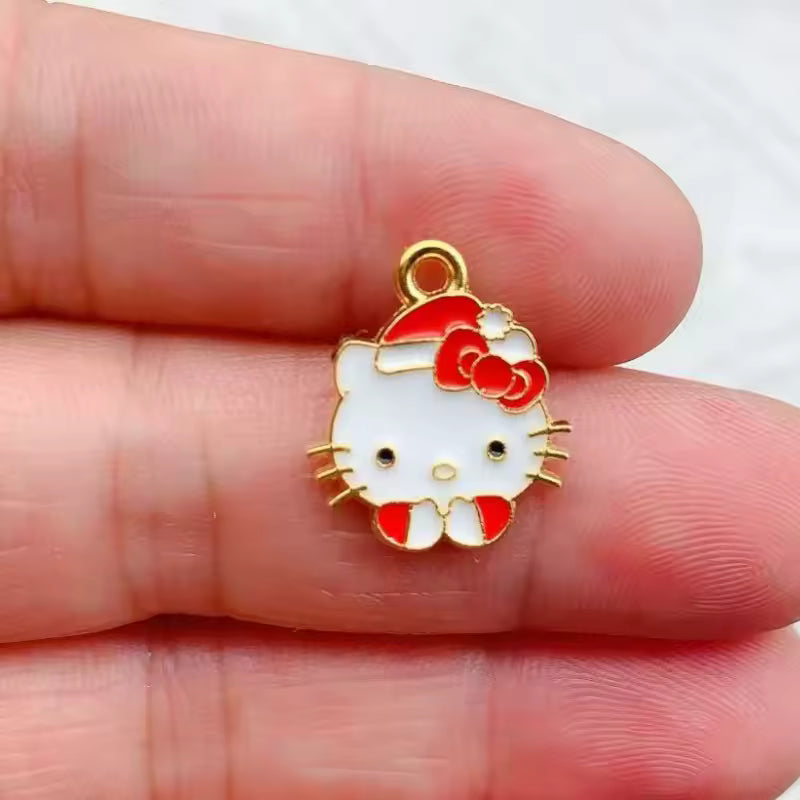 Dije Sanrio Metlálicos 4 Pack 50%Desc